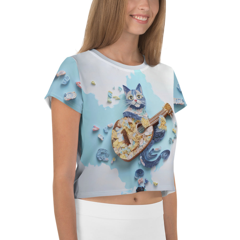 Artistic Aviary Flight Women's Crop Tee paired with jeans in a casual setting.