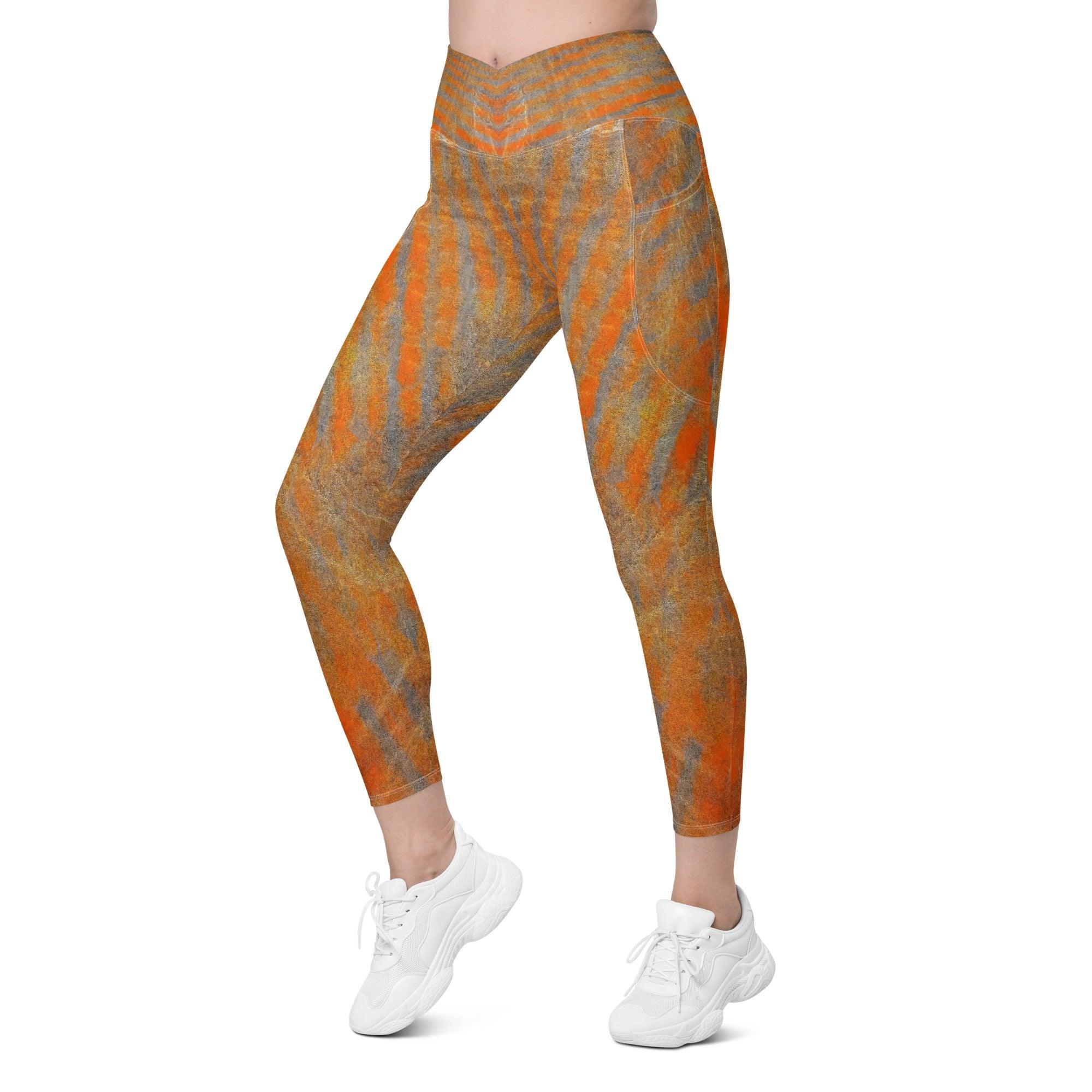 Energetic Orange Leggings with crossover design and pockets for style and convenience