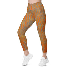 Energetic Orange Leggings with crossover design and pockets for style and convenience