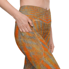 Vibrant Orange Crossover Leggings with practical pockets for active wear