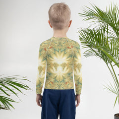 Child wearing CB6-17 Rash Guard while surfing