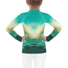 Young swimmer wearing CB6-07 rash guard - side profile in action