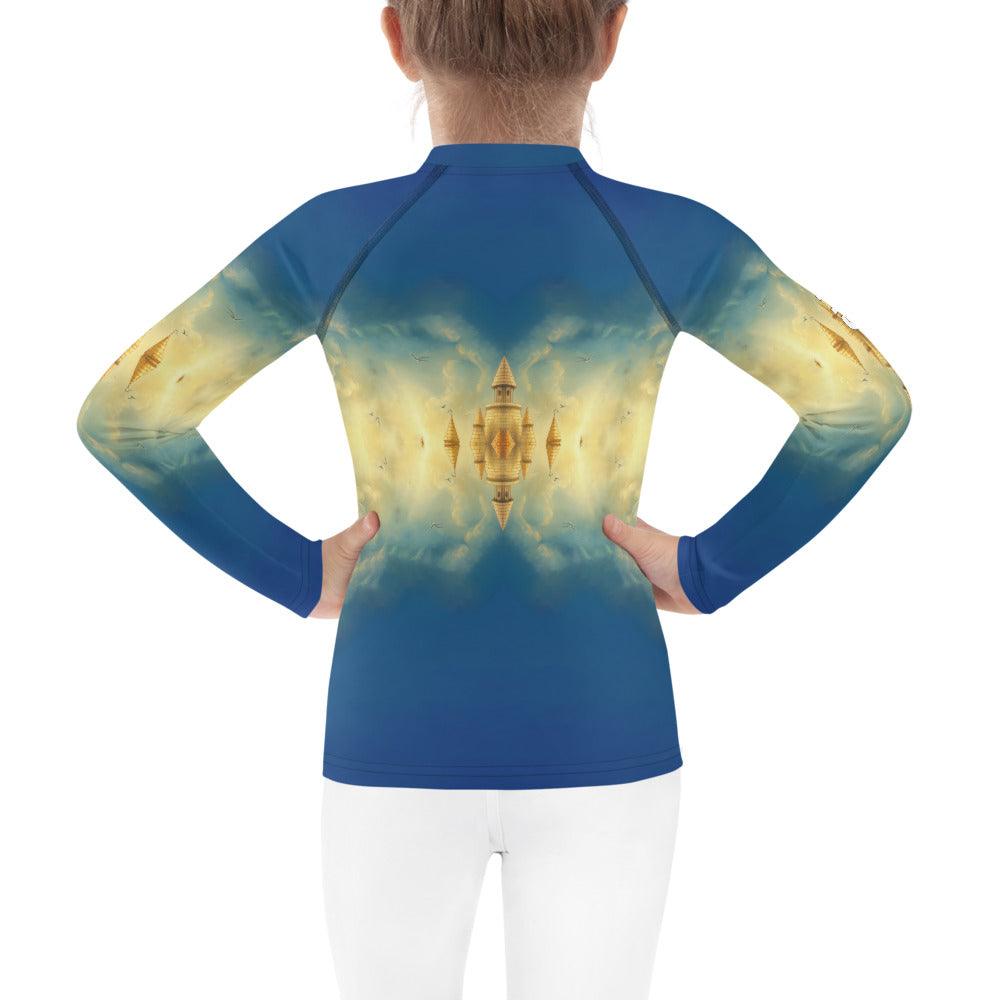 Back view of the CB3-121 Kids Rash Guard on a child at the beach