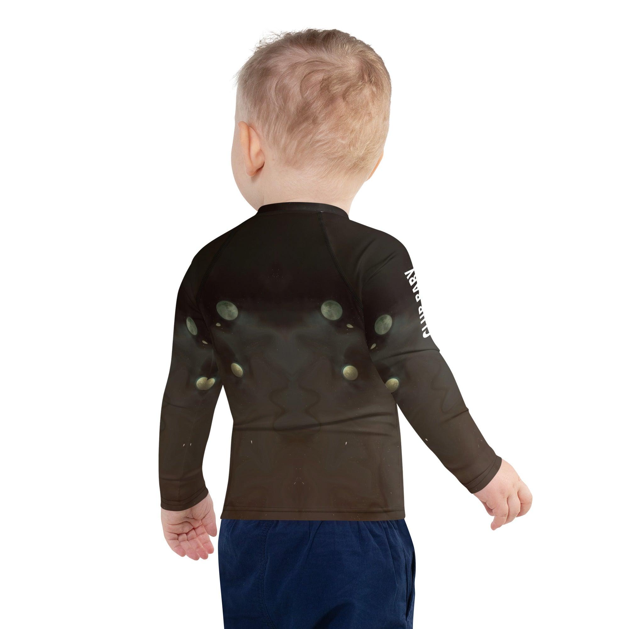 Child wearing CB3-70 Rash Guard demonstrating flexibility