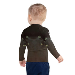 Child wearing CB3-70 Rash Guard demonstrating flexibility
