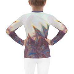 Child wearing CB3-99 rash guard swimming in the pool.