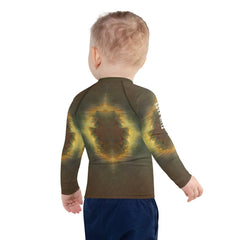 Side view of child sporting the CB3-116 Kids Rash Guard