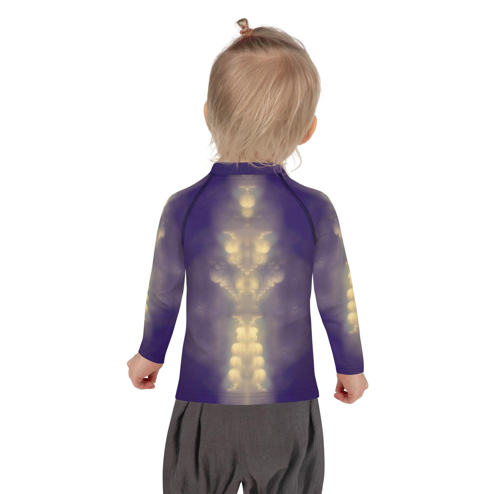 Young swimmer wearing CB3-117 kids rash guard showcasing back design.