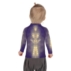 Young swimmer wearing CB3-117 kids rash guard showcasing back design.
