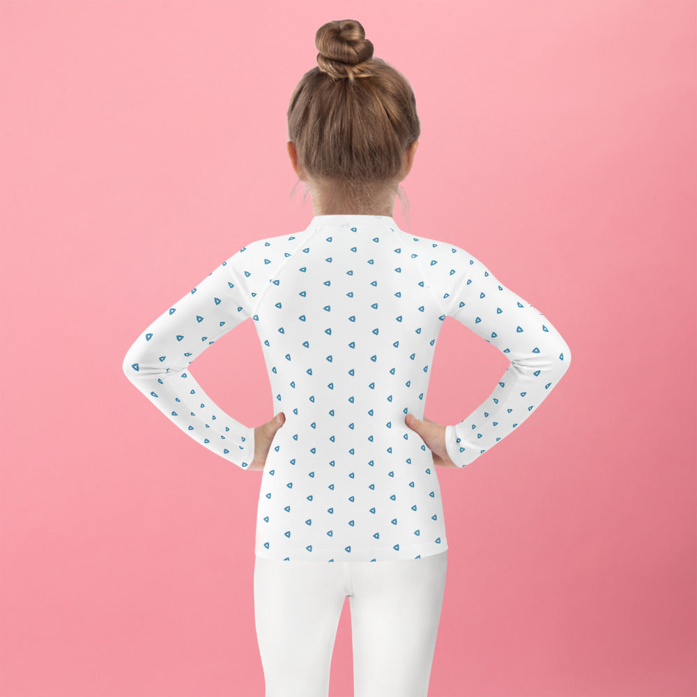 Child wearing patterned protective swimwear