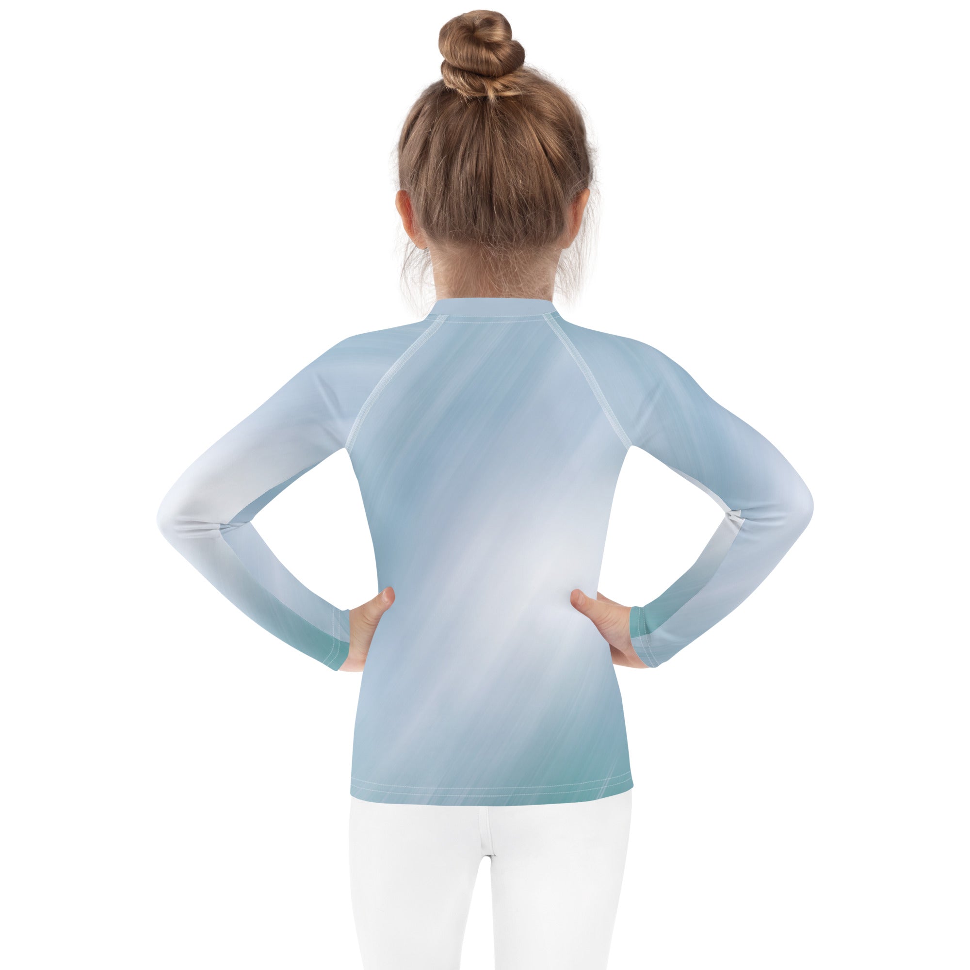 Child wearing UV protection swim rash guard
