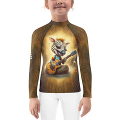 Child wearing CB3-108 rash guard at the beach