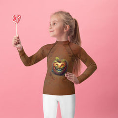 Back view of child wearing CB3-130 Kids Rash Guard