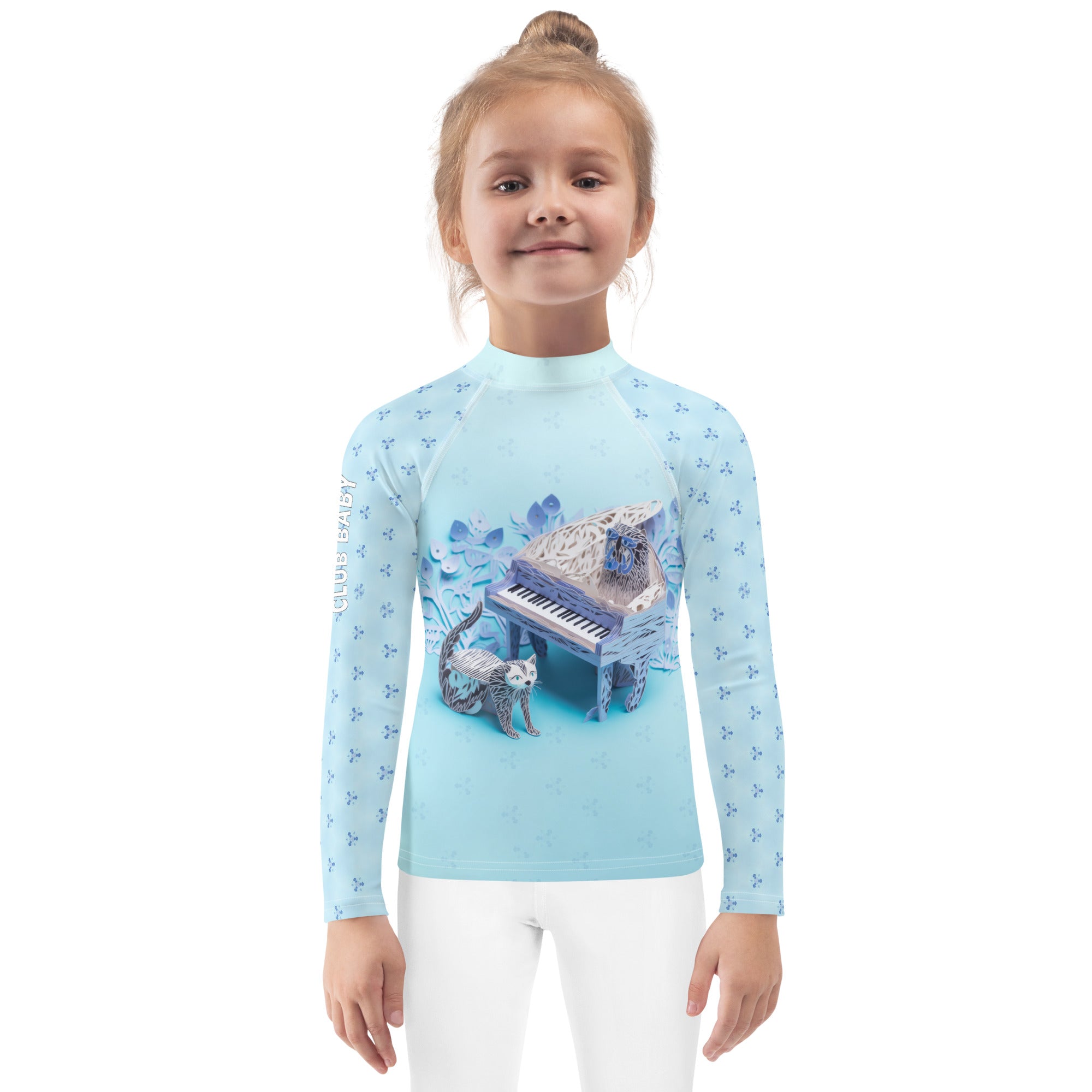 Child wearing Kirigami Garden rash guard playing outdoors