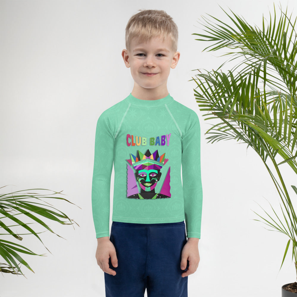 Child wearing Frog Prince themed rash guard on lily pad design.