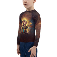 Action shot of a kid surfing wearing the CB3-93 rash guard