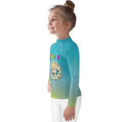 Kid playing in the sand wearing Pixie Hollow rash guard
