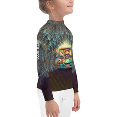 Rear view of kid in CB3-113 Rash Guard at the beach.