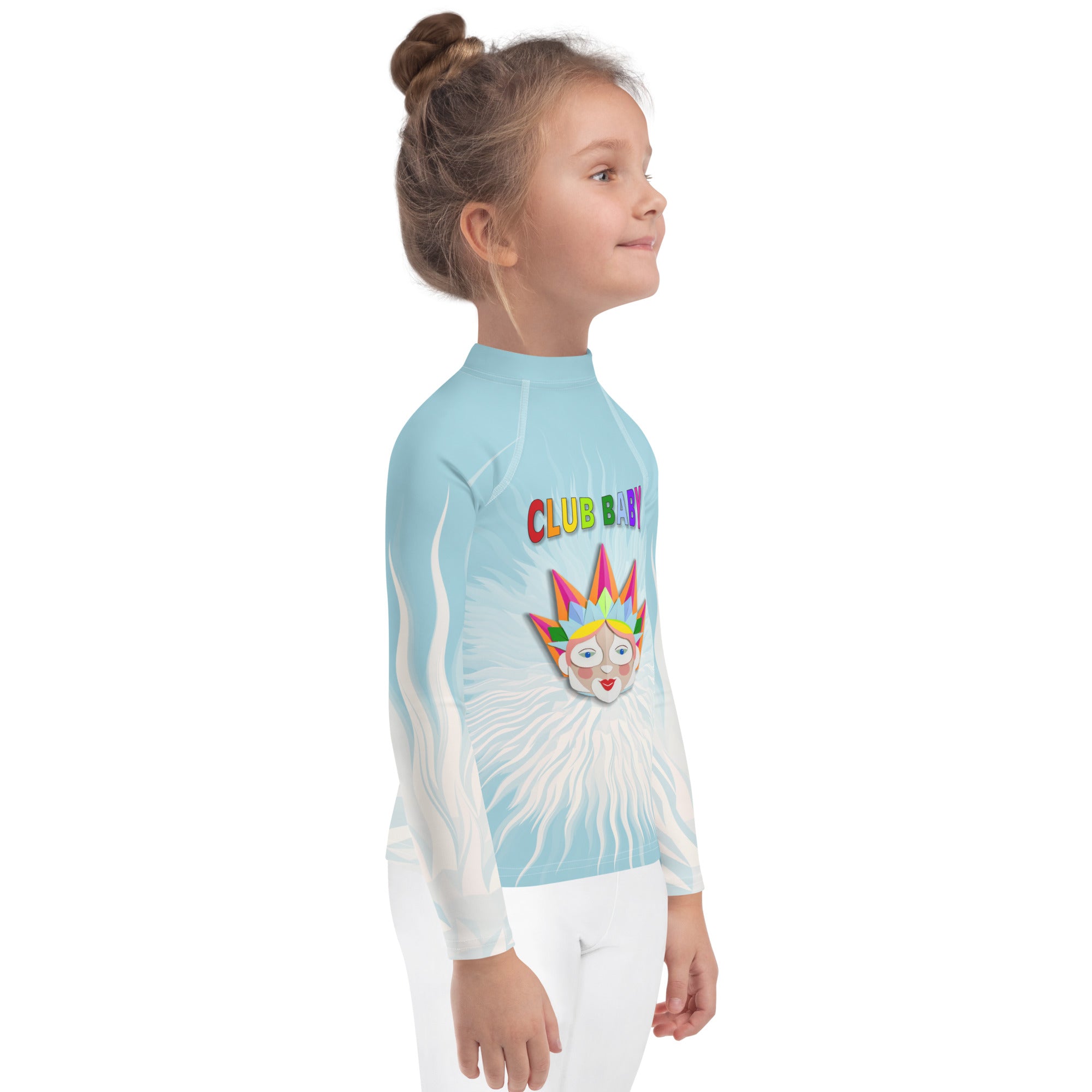 Child wearing Cinderella's Ball rash guard at the beach
