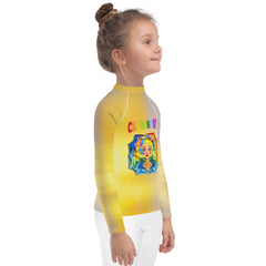 Girl sporting Hansel and Gretel patterned rash guard during outdoor activities.





