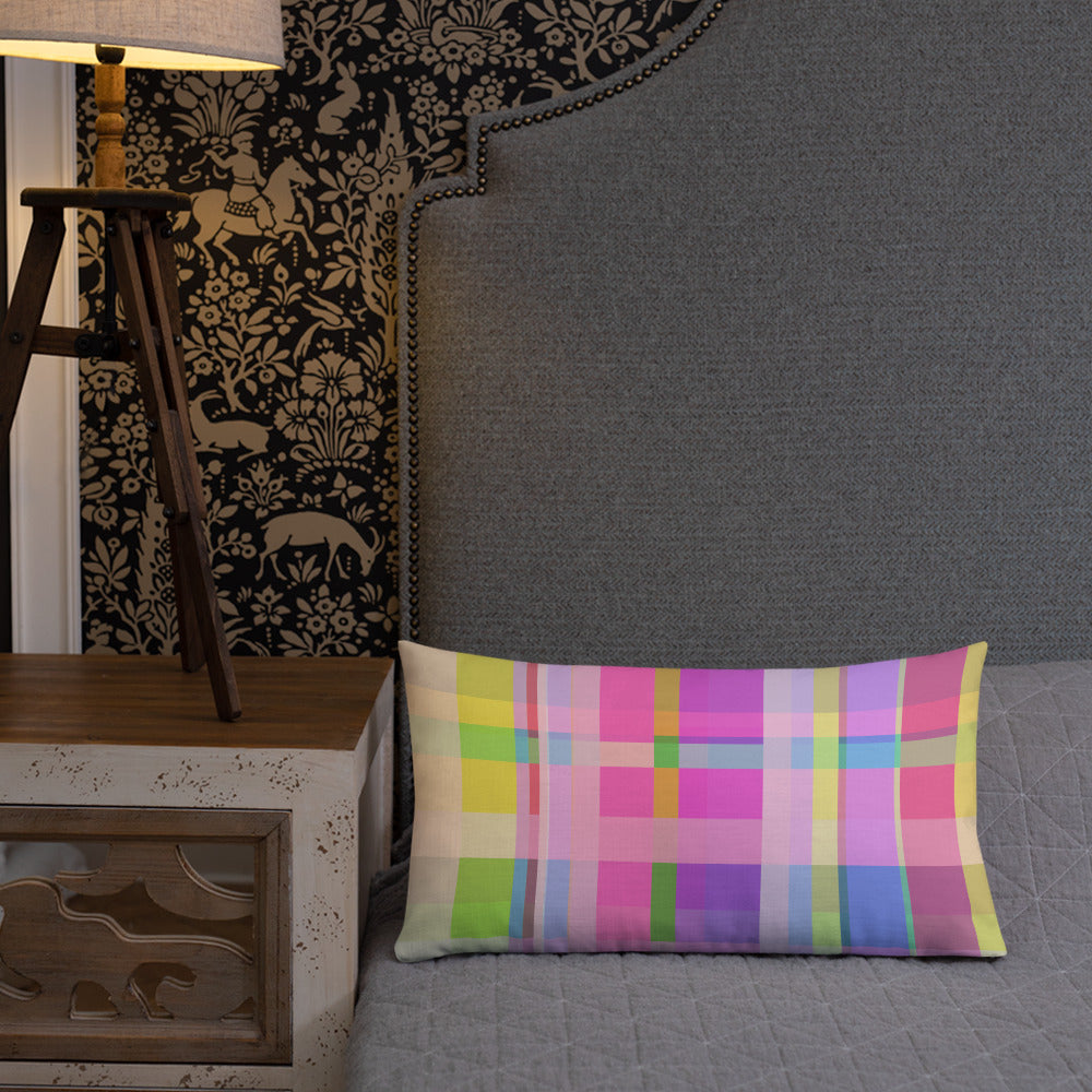 Stylish Rainbow Boxed Delight Accent Pillow on an armchair.