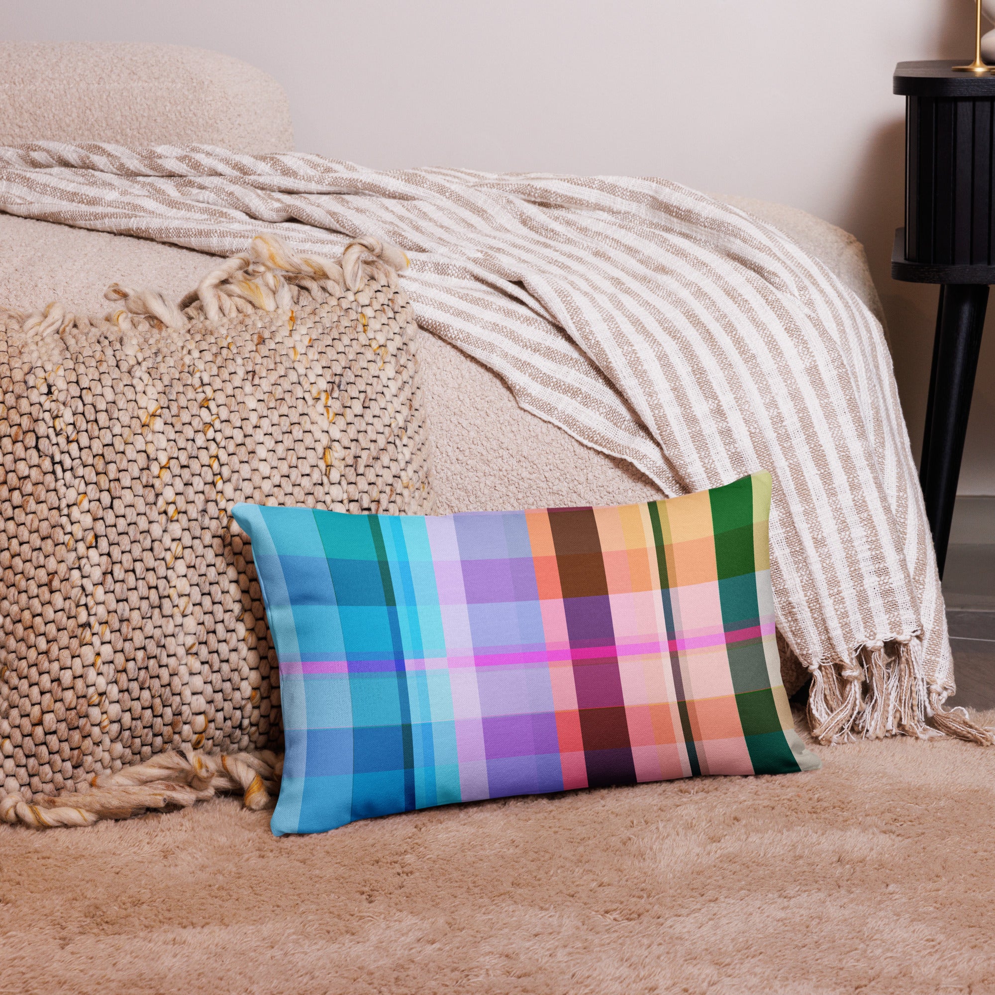 Retro Rainbow Blast Premium Accent Pillow displayed on a couch, showcasing its colorful and retro-inspired design.