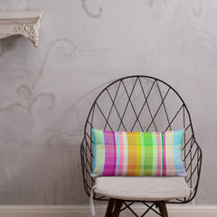 Cosmic Carnival Premium Accent Pillow displayed on a couch, showcasing its vibrant and colorful design.