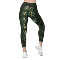 Woman wearing vibrant mosaic crossover leggings at the gym