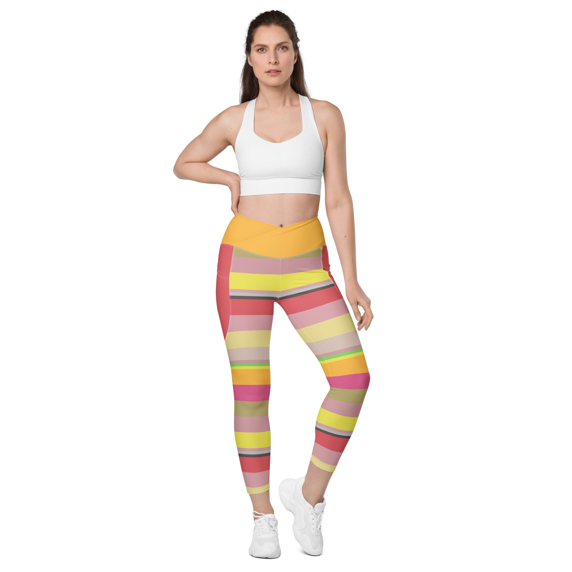 Psychedelic Prism Crossover Leggings worn by a model in a dynamic pose.