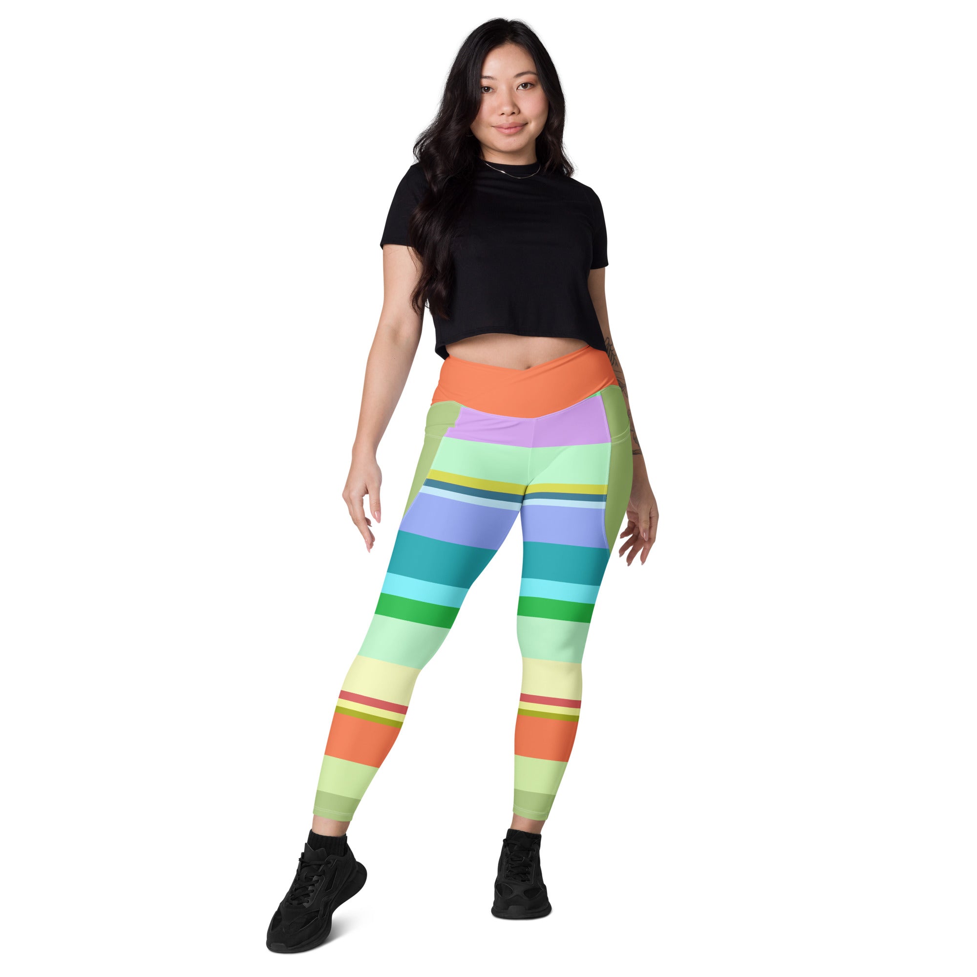 Back view showing the crossover waist of Retro Rainbow Blast Leggings.