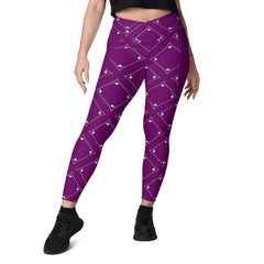 Geometric Bliss leggings with crossover waistband and side pockets.