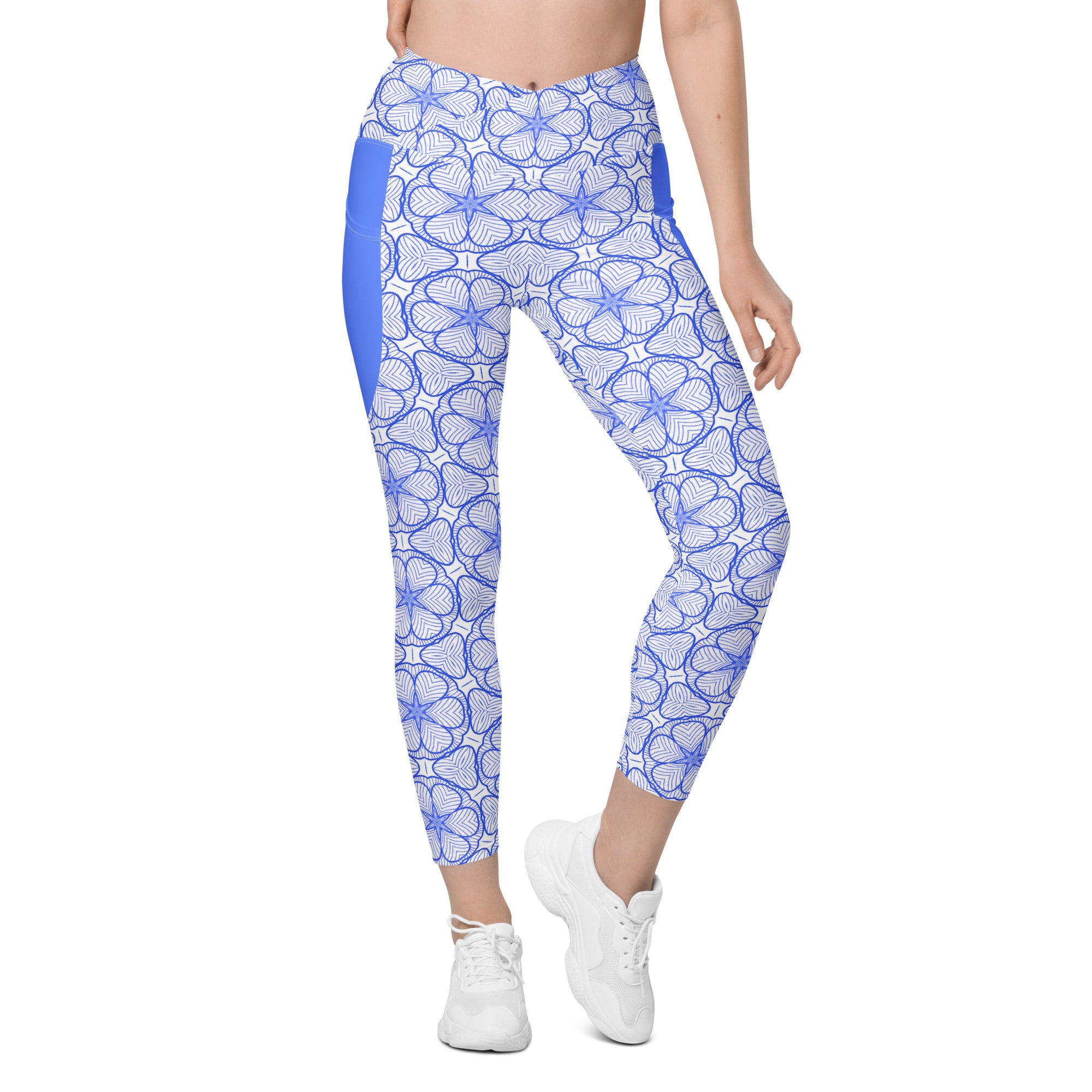 Tribal-patterned crossover leggings with side pockets.