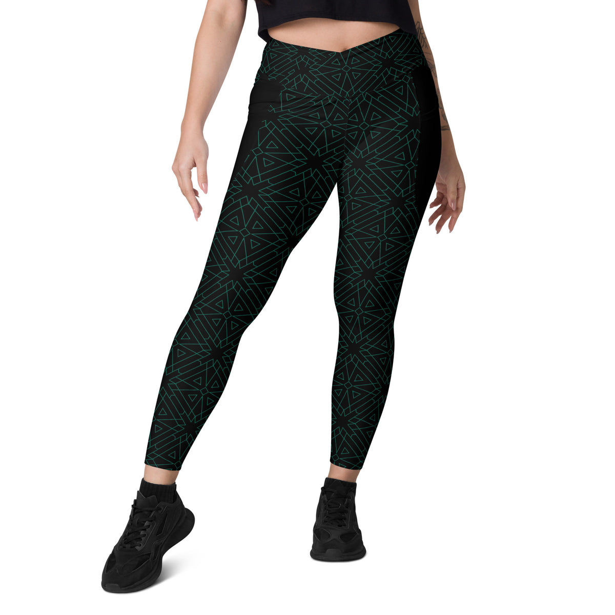 Marble-patterned crossover leggings with side pockets for women.