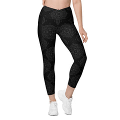 Camouflage crossover leggings with side pockets on model.