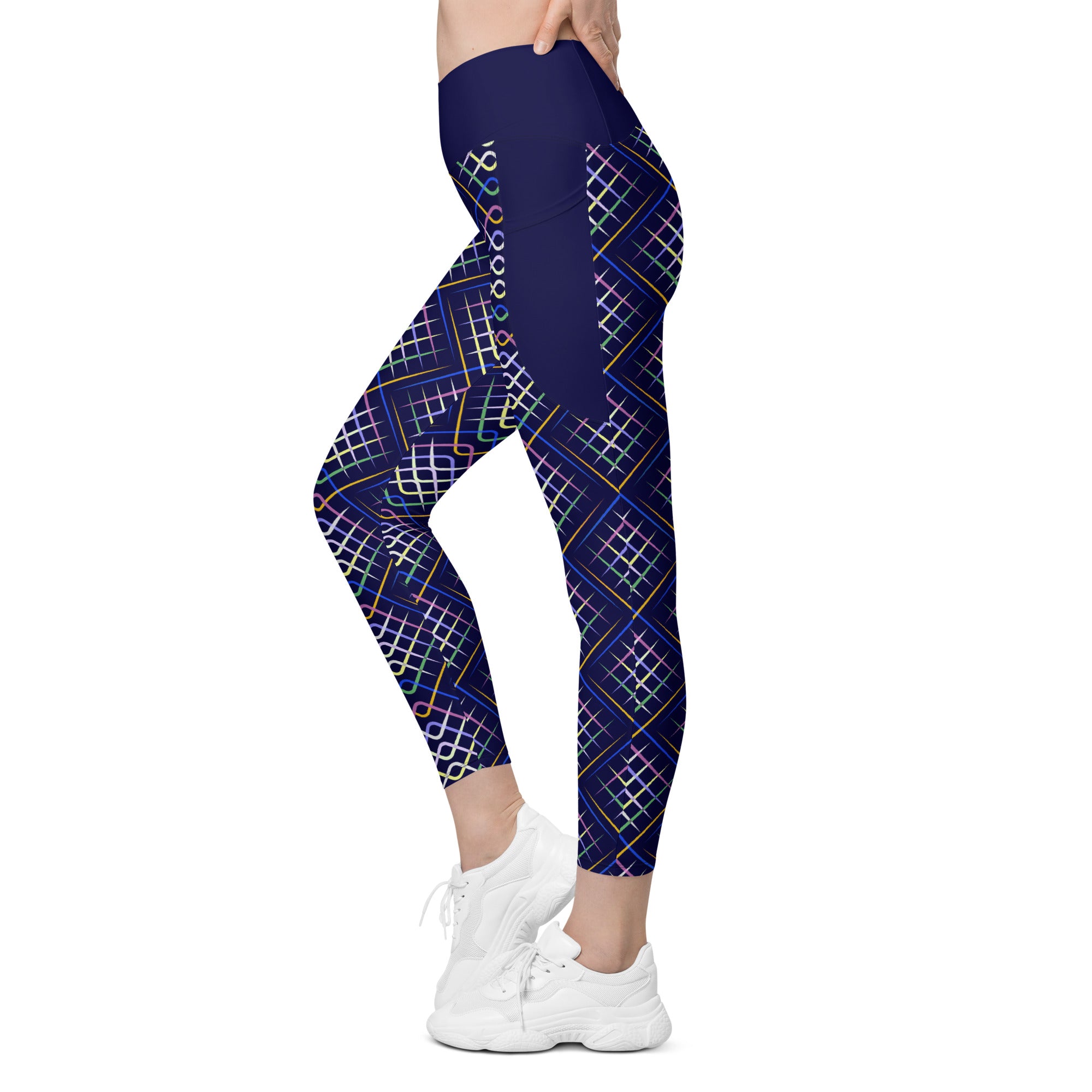 Pair of Geometric Delight leggings folded on display.