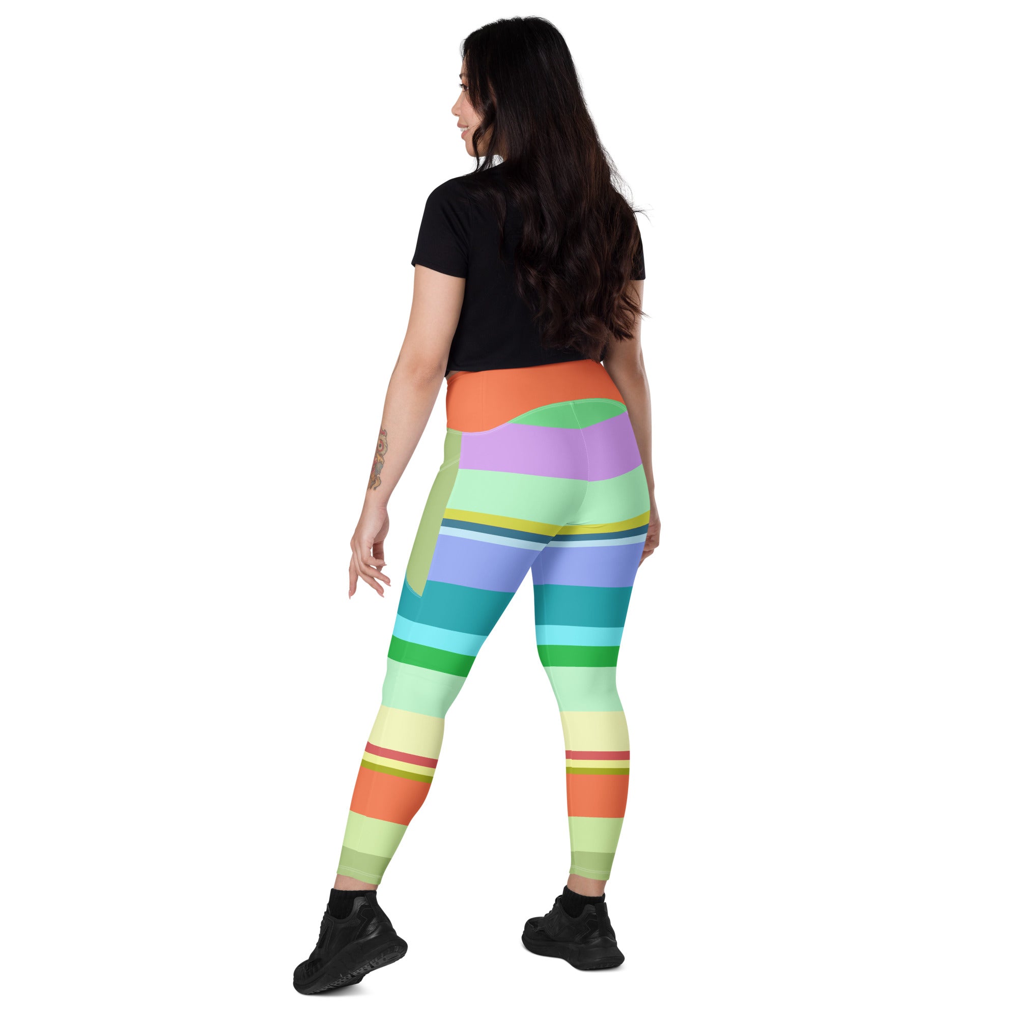 Outdoor jogging in Retro Rainbow Blast Crossover Leggings.