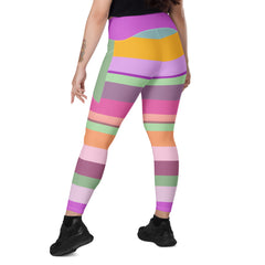 Laid flat Summer Sunset Hues Leggings showcasing their vibrant pattern.