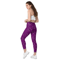 Elegant and functional crossover leggings with geometric design and pockets.