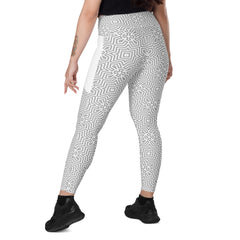 Elegant paisley print crossover leggings with practical pockets.