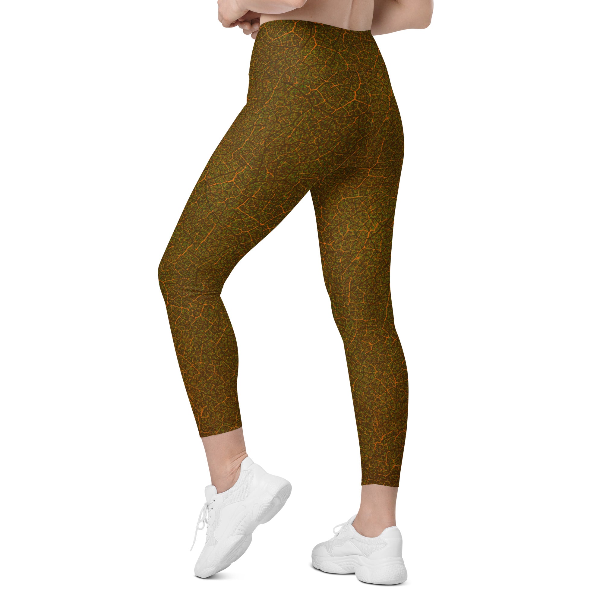 Active lifestyle shot of woman jogging in Forest Dreams Crossover Leggings, emphasizing the practical pockets.