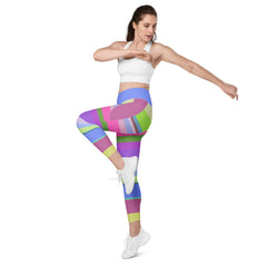 Folded Cosmic Carnival Leggings showcasing the vibrant cosmic print.