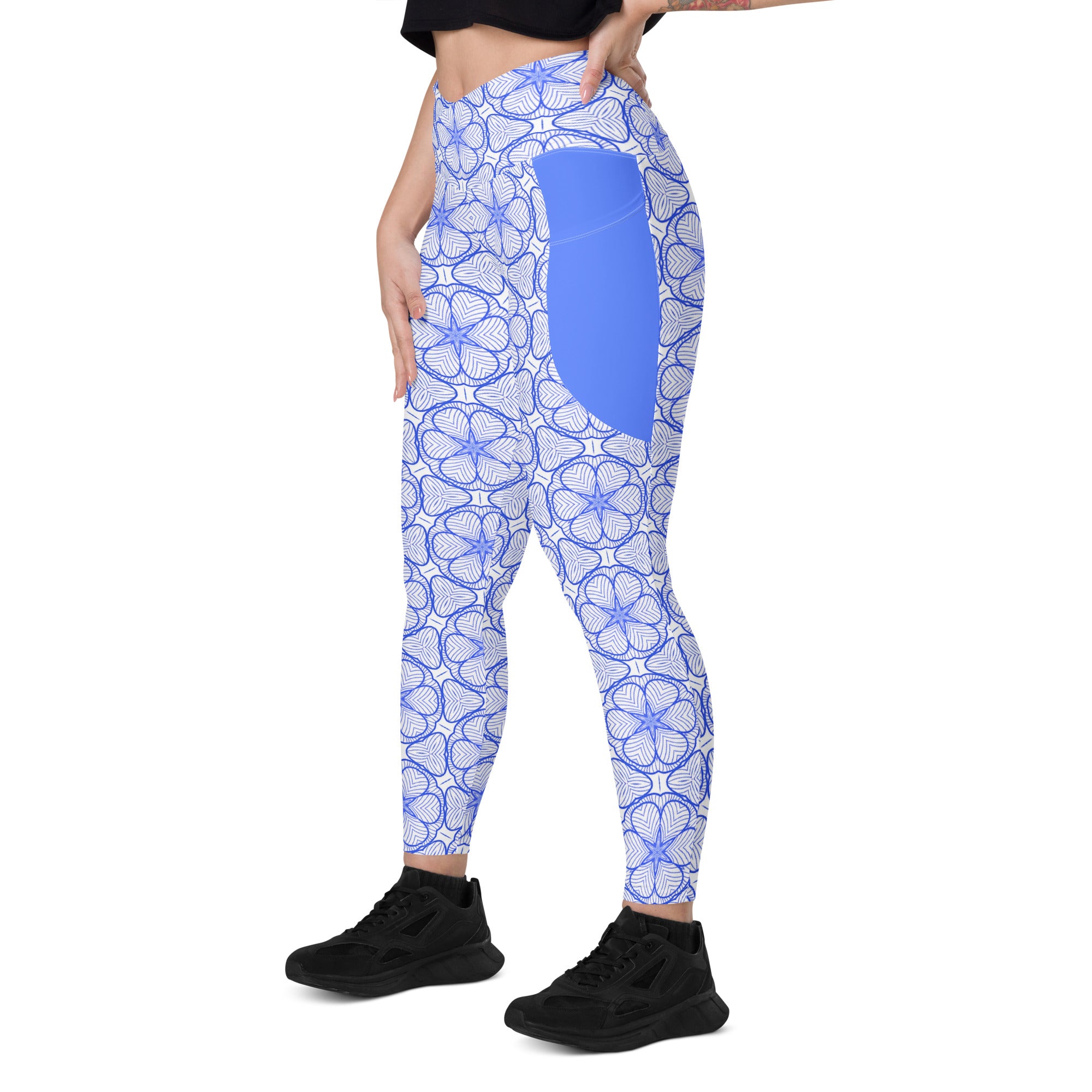 Side view of tribal harmony leggings showing pocket utility.