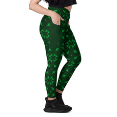 Fashion-forward crossover leggings featuring serene swirl pattern and pockets.