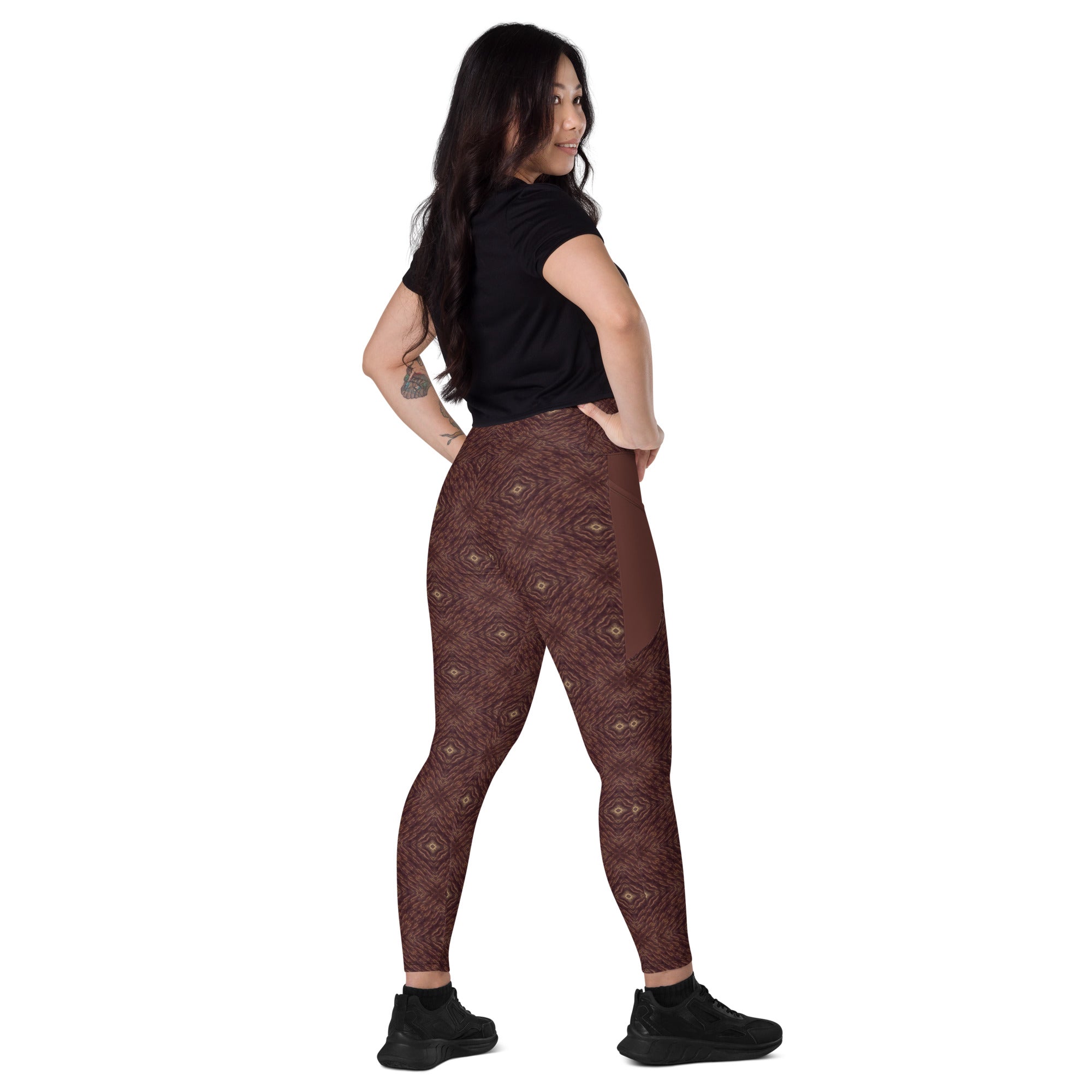 Paisley patterned crossover leggings with pockets for on-the-go.