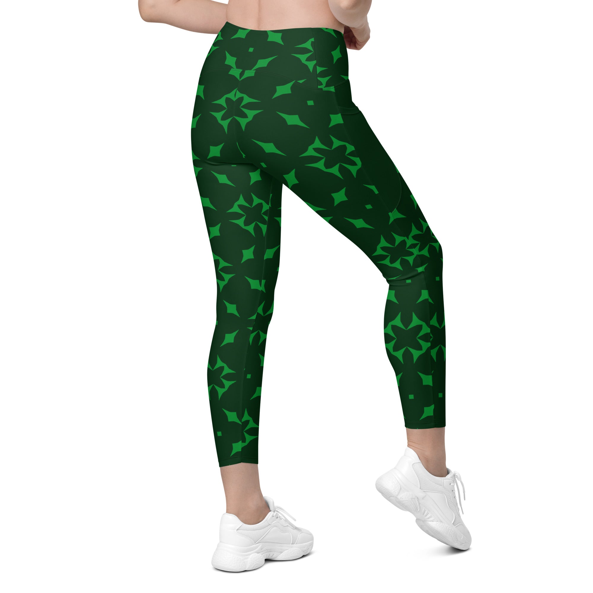 Elegant crossover leggings with serene swirl design and practical pockets.