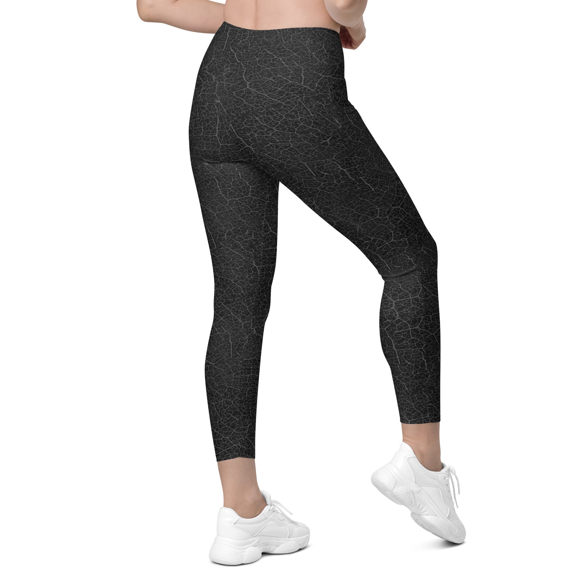 Close-up of Zen Garden Leggings' crossover waistband, offering a blend of style and comfort for any activity.