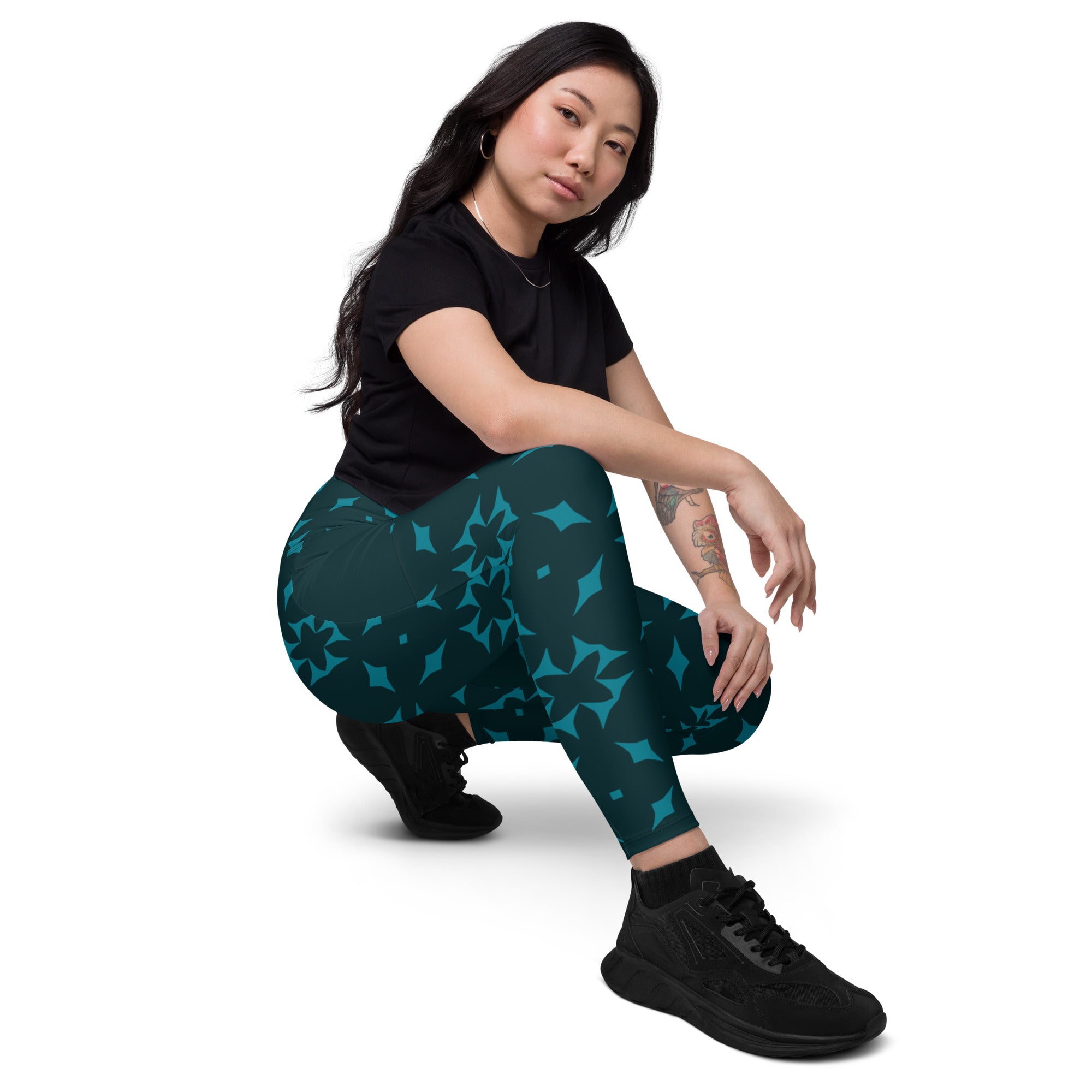 Woman wearing Boho Blossom Leggings doing yoga