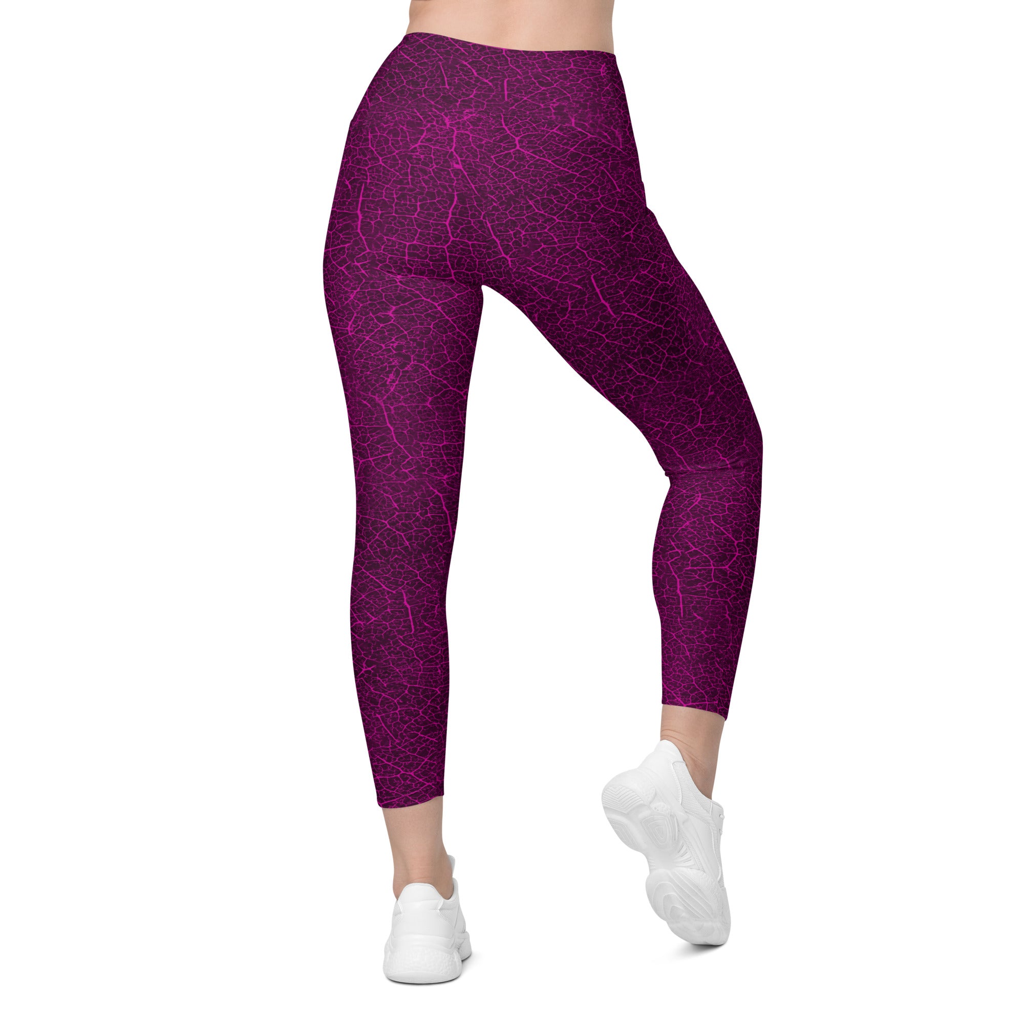 Active wear that breathes life into your routine, featuring dewy meadow leggings with leaf detail and pockets.