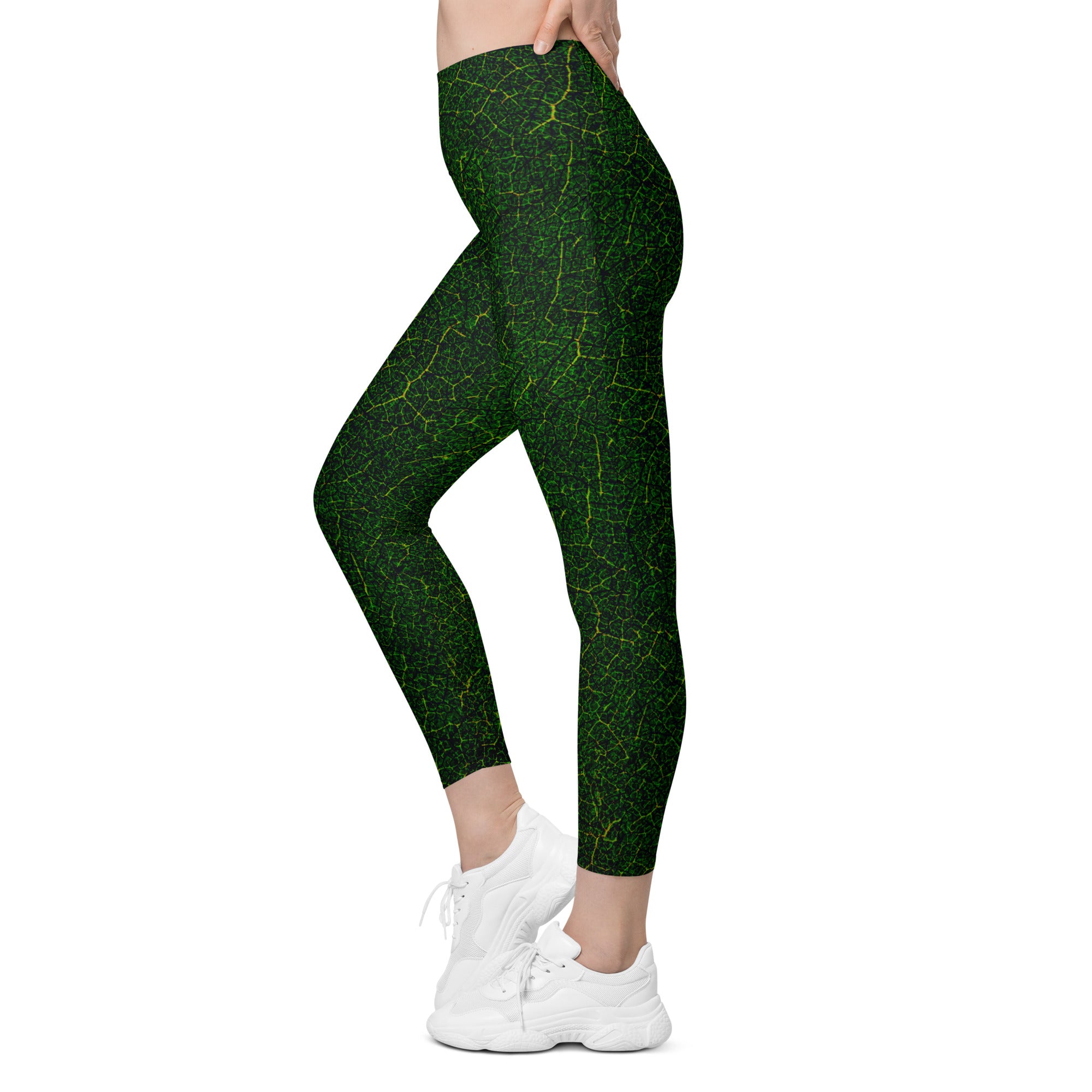 Leaf-patterned leggings with pockets, inviting you to the whimsy of an enchanted garden adventure.
