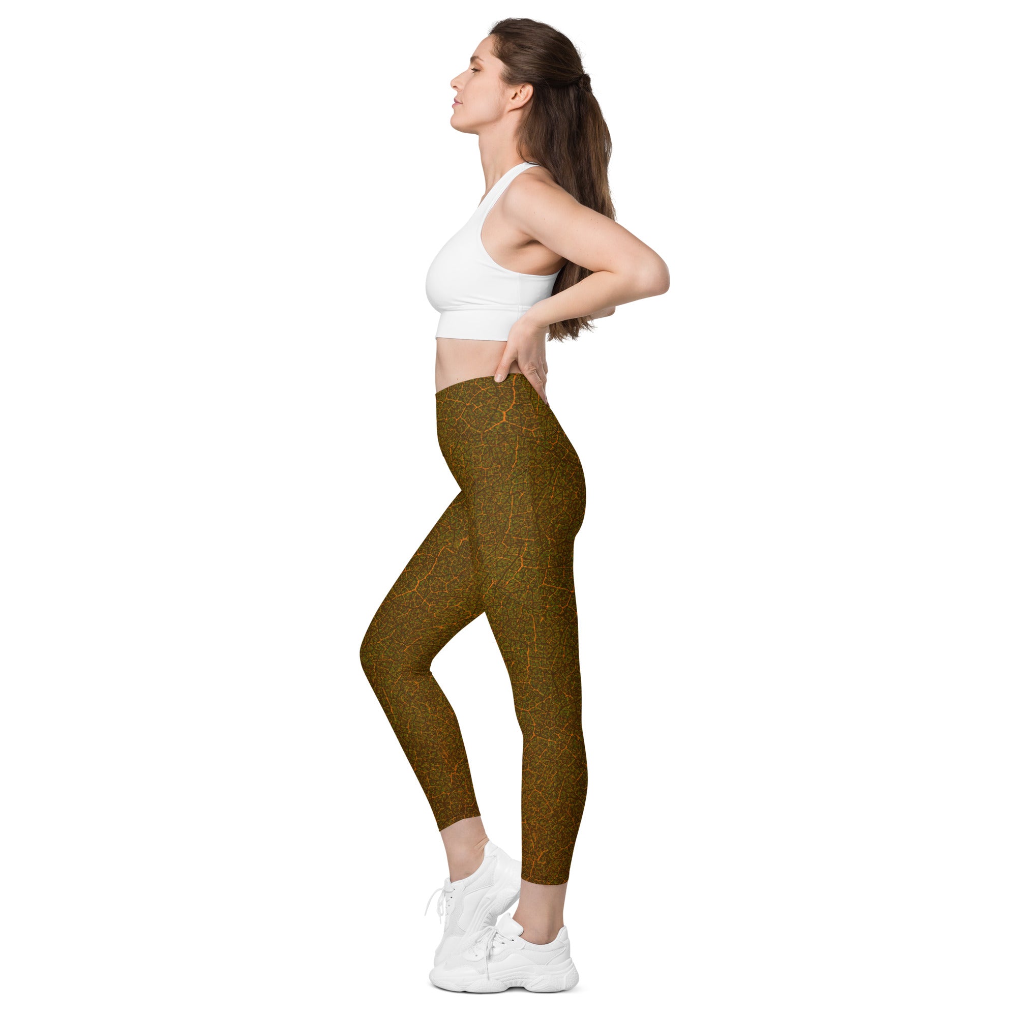 Eco-inspired leaf texture leggings with pockets, blending fashion with the functionality for active lifestyles.